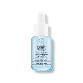 Egy 30 ml-es Kiehl's Clearly Corrective Triple Acid Peel uveg tiszta folyadekkal, feher hatter előtt.