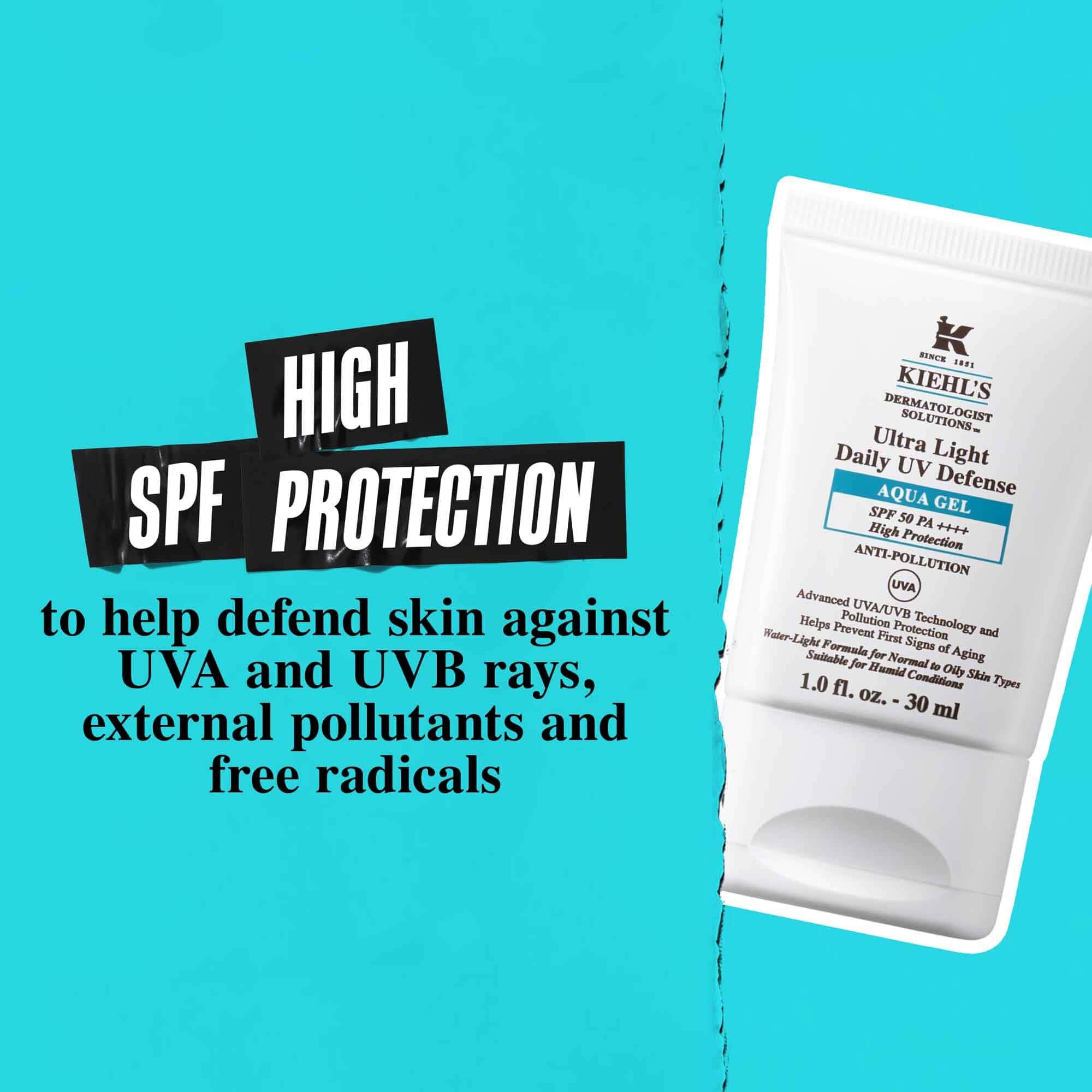 Egy Ultra Light Daily UV Defense Aqua Gel tubus kek hatter előtt, a szoveg jelentese: „Magas SPF vedelem, amely segit megvedeni a bőrt az UVA es UVB sugaraktol, a kulső szennyeződesektől es a szabad gyokoktől.”
