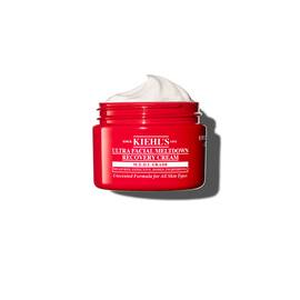 A Kiehl’s Ultra Facial Meltdown Recovery Cream Whip piros tegelye, lagy, habos texturaval.