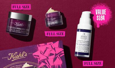 A graphic displays three Kiehl's products and a gift box against a dark red background with bright pink graphic elements. A purple jar of " Kiehl's SUPER MULTI-CORRECTIVE CREAM" is on the left, labeled "FULL SIZE" in a pink box. Above it is a smaller purple jar of " Kiehl's SUPER MULTI-CORRECTIVE EYE ZONE TREATMENT", also labeled "FULL SIZE" in a pink box below it. On the right, a white and purple bottle of "KIEHL'S Retinol Skin-Renewing Daily Micro-Dose Serum" is visible, with a pink box below it stating "FULL SIZE". A larger pink graphic splash in the upper right corner announces "VALUE $184".