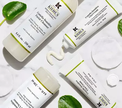 Kiehls Cica tisztito es hidratalo termekek, feher hatteren, zold level diszitessel.