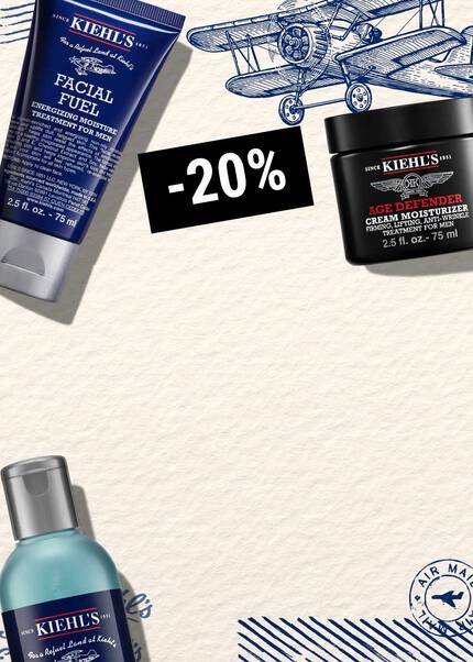 Kreativ feher hatterrel, egy repulőgep vazlataval es Kiehl's termekekkel.