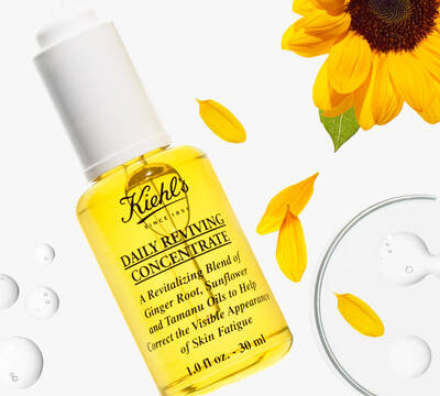 Kiehls Daily Reviving Concentrate, napsugar sarga uveg, viragpetalak es vizcseppek kisereteben, bőrapolasra.